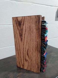 a wooden book is stacked on top of each other