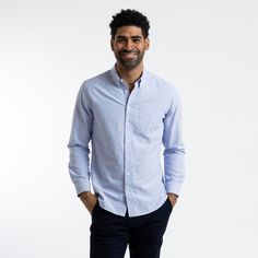 The Blue Oxford shirt is one of the most timeless and versatile pieces in the service industry, able to be dressed up with a blazer, or down with jeans and sneakers. The updated and upgraded version of our Service Oxford features an equally durable but much softer 75/25 cotton poly blend, as well as cleaner stitching, a crisper collar, and an improved fit. Features: Button-down collar, clean finished seams Material: 75% Cotton, 25% Polyester, 4oz Blue Oxford Cloth Fit: Model is 6'0"/170 lbs, wea Blue Relaxed Fit Dress Shirt For Spring, Light Blue Cotton Dress Shirt For Spring, Blue Unstructured Shirt For Business Casual, Classic Blue Relaxed Fit Dress Shirt, Casual Blue Dress Shirt For Work, Blue Cotton Dress Shirt For Business Casual, Blue Relaxed Fit Dress Shirt For Business, Light Blue Casual Dress Shirt For Business Casual, Blue Relaxed Fit Dress Shirt For Work