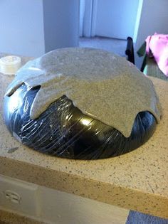 a silver object sitting on top of a counter