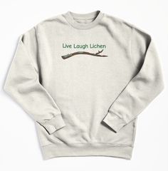 a white sweatshirt with the words live laugh lichen on it's front and back