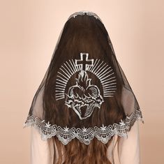 Follow us on ins, and give out coupons from time to time. https://www.instagram.com/mantveils/ Our exquisite Mantilla D-Shaped Veil with Embroidered Sacred Heart Cross and Scalloped Edge, a truly stunning and reverent headpiece that will elevate your spiritual experience. Crafted with love and devotion, this one-piece veil is designed in a classic D-shape to provide excellent coverage while maintaining a sense of grace and elegance. The centerpiece of this veil is the intricately embroidered Sacred Heart Cross, a powerful symbol of love, devotion, and faith. The beautiful cross design adds a touch of reverence to your attire, serving as a visual reminder of your spiritual connection. The delicate embroidery is a testament to the care and craftsmanship put into every detail of this veil. Me Cap Veil, Chapel Veil, Goth Wedding, Dark Wedding, Spiritual Experience, Cross Designs, Draped Fabric, Grunge Style, Sacred Heart