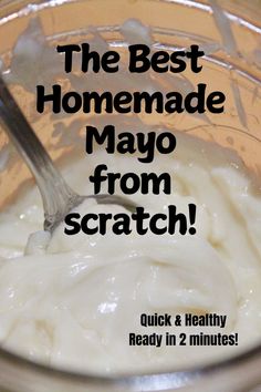 the best homemade mayo from scratch is in a glass jar with a spoon inside it