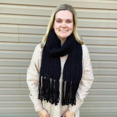 Wrap this scarf around your neck on a cold day and it will keep you nice and warm!  This is a chunky knit scarf in black.  This scarf is over 60 inches long (with fringe) and it would even be a great gift! Made of soft, high quality super bulky yarn that you can wear year after year and it will still look the same as you when you got it. You can choose if you want it to have fringe (tassels) or not. Casual Knitted Scarves In Acrylic Yarn, Acrylic Yarn Scarf For Cold Weather, Cold Weather Acrylic Yarn Scarves, Cold Weather Acrylic Yarn Scarf, Chunky Knit Scarves For Cold Weather, Warm Casual Scarf In Acrylic Yarn, Warm Casual Acrylic Yarn Scarf, Knitted Acrylic Scarves For Cold Weather, Casual Hand Knitted Winter Scarves