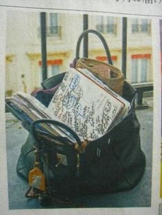 a newspaper article with an image of a handbag