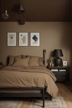 a bed sitting in a bedroom on top of a wooden floor next to two lamps