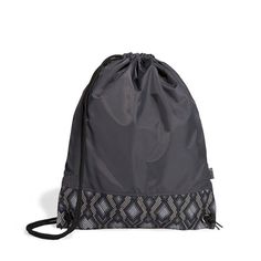 a black drawsack bag with an argyle pattern on the front and side, sitting against a white background