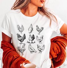 Discover our charming Vintage Chickens Shirt, perfect for every chicken enthusiast and farm aficionado! 🐔 This Chicken Lover Shirt is designed with a whimsy touch, making it an ideal pick for those weekends at the farm or casual outings. The Funny Chicken T-Shirt is not just an apparel choice; it's a conversation starter!  🌿 **Unique Features ✨ Delightful vintage print for that retro vibe ✨ Perfect for chicken lovers, farmers, and humor enthusiasts ✨ Versatile design suited for any casual occa Farm Chicken, Chicken Shirt, Farmer Shirt, Chicken Tshirts, Chicken Shirts, Funny Chicken, Time Tracking, Chicken Humor, Chicken Lovers