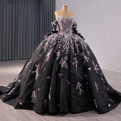 Transform into a princess with our Quinceañera Ball Gown. Extravagant crystal beading and delicate pink details adorn this black masterpiece. The off-the-shoulder beaded sleeves add an extra element of elegance. With a full, pleated skirt and adjustable lace-up back, this gown is fit for royalty. type: a line ball gown color as shown built in bra sweetheart neckline train as shown lace up back Fairytale Wedding Gown, Red Quinceanera Dress, Beaded Sleeves, Champagne Quinceanera Dresses, White Quinceanera Dresses, Purple Quinceanera Dresses, Black Quinceanera Dresses, Quinceanera Dresses Gold, Plus Size Evening Gown