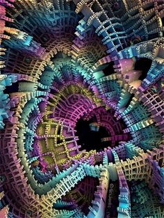 an abstract image with many different colors and shapes in the center, as well as a spiral