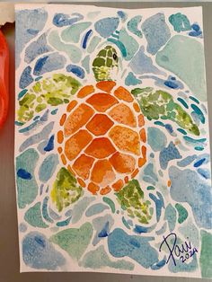 a watercolor drawing of a sea turtle with blue, green and orange colors on it's shell