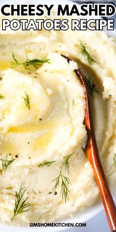 mashed potatoes in a white bowl with a wooden spoon and text overlay that reads cheesy mashed potatoes recipe