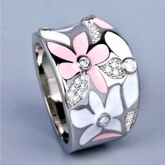 New Boho Style Pink White Floral Enamel Silver Wide Band Ring Includes Clusters Of Cz “Diamonds” Set In Silver Tone Choose Women’s Size 6, 7, 8 Elegant Silver Enamel Ring In Sterling Silver, White Cubic Zirconia Flower Ring With Diamond Accents, Silver Flower Enamel Ring As A Gift, Silver Diamond Enamel Ring, Elegant Silver Enamel Ring For Anniversary, Elegant Silver Enamel Ring For Wedding, White Flower Ring With Diamond Accents For Gift, White Diamond Enamel Ring, White Gold Enamel Ring For Anniversary