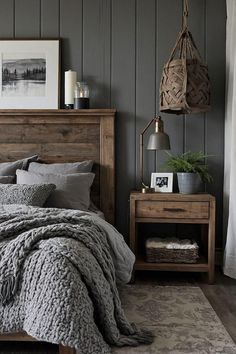 a bedroom with gray walls and wooden furniture