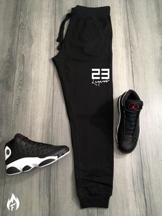 Threads On Fire's new heat, the men's sneaker matching 23 Legend Black Sweatsuit Hoodie and Joggers Set with white graphics. Crafted for maximum style and comfort, it's the perfect match for your Air Jordan 13 sneakers. Ships out via USPS Ground. Hassle free returns and exchanges. Key Features: - Premium cotton/poly 80/20 blend for comfort and durability - Bold, white graphics stand out and look clean - Complete set for that dope streetwear drip Don't miss out! Grab your 23 Legend Sweatsuit Hood Casual Activewear With Logo Print For Winter, Casual Winter Activewear With Logo Print, Black Breathable Sweatpants For Streetwear, Black Breathable Joggers For Streetwear, Sporty Breathable Sweatpants For Streetwear, Casual Sports Joggers With Logo Print, Black Logo Print Joggers For Streetwear, Sporty White Joggers With Letter Print, White Sporty Joggers With Letter Print