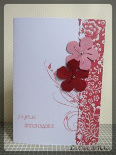 a close up of a card with flowers on it