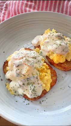 two pieces of bread topped with eggs and cheese