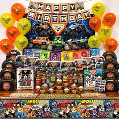 a birthday party with monster trucks and balloons