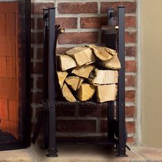 a stack of firewood sitting in front of a brick wall next to a fireplace