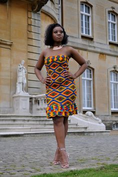 Our African Kente Print bandeau  body con dress with a frilled hem is the perfect piece to wear to a summer event or party It can be styled nicely with gold jewellery or a head wrap for a finishing touch. 100% African wax cotton  Fits different shapes and sizes Filled hem  We also make custom made clothing which can be made to measure if you provide fabrics and the style of what you would like us to produce them we can give you and estimated dispatch and delivery time  INSTRUCTIONS Machine washable on a low heat at 20 degrees  Do not bleach Kente Gown Styles, Robe Kente, Kente Print, Kente Dress, Dashiki Dress, Dress African, Fashion Forever, Custom Made Clothing, Body Con Dress