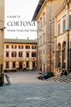 a cobblestone street with the words a guide to cortona things to do and travel tips