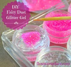 three jars with pink glitter in them and a yellow toothpick sticking out of one