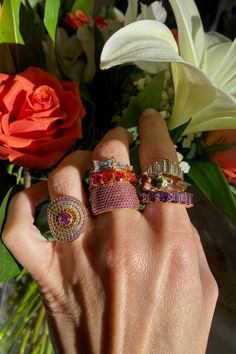 This stunning circle ring features multi-colored pink, orange, and yellow pave cz stones with a unique yellow gold vermeil finish. Stacked Rings Aesthetic, Maximalist Jewelry, Braided Ring Band, Jewel Art, Colored Jewelry, Bath And Body Shop, Layering Necklaces, Circle Ring, Jewelry Lookbook