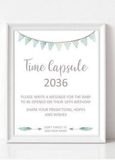 a white framed sign that says time capsulee 205 with leaves hanging from the line