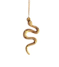 Alluring textured Turkish snake pendant necklace on a 14k gold chain Pendant: 2" Long Necklace: 12" Long in total Gold Snake-shape Chain Jewelry, Gold Snake Shape Chain Jewelry, Yellow Gold Snake Chain Necklace, Delicate Metal Snake-shape Chain Necklace, Snake Shape Gold Chain Necklace Gift, Metal Snake Shape Necklace, Metal Snake Chain Necklace For Gift, Gold Snake Shape Chain Necklace Gift, Gold Plated Snake Shaped Necklace With Adjustable Chain