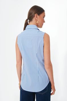 Frustrated with button downs that never seemed to fit right, local DC designer Rochelle Behrens set out to create the perfect shirt. Her patented “No Gape” technology earned her shirts the honor of being named “Must Have Fashion Item of the Year” by Oprah.Your new warm weather staple, introducing the Blue and White Stripe Shirt. Layered under a sweater (hello summer office air conditioning) or on its own, this sleeveless number is a classic re-imagined to suit your downtown/uptown sensibilities. Cotton Sleeveless Blouse For Work, Summer Office, White Stripes Shirt, Plus And Minus, Cocktail Attire, Stripe Shirt, Hello Summer, Sleeveless Shirt, Pullover Sweatshirts