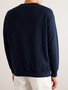 Taking cues from retro athleisure, Brunello Cucinelli's sweatshirt is detailed with a crest and creed on the front. It's been made in Italy from loopback cotton-blend jersey that's soft and comfortable. Wear it with sweatpants or chinos and a gilet. Luxury Sporty Blue Sweatshirt, Luxury Crew Neck T-shirt With Embroidered Logo, Luxury Blue Crew Neck Sweatshirt, Luxury Logo Print Men's Sweatshirt, Luxury Men's Garment-dyed Sweatshirt, Activewear Print, Brunello Cucinelli Men, Jersey Sweatshirt, Wardrobe Edit