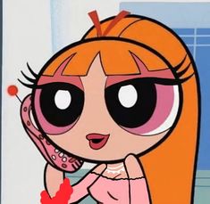 the powerpuff girl is talking on her cell phone and holding a heart shaped object