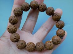 Material: natural Syagrus romanzoffiana (Natural Wood, Fragrance Free ) Size: dia. 13-14 mm round each piece Hole Side: 1.2 mm about QTY: full strand (16-17 beads) you will received Wooden Beads Rosary Bracelet For Meditation, Meditation Rosary Bracelet With Wooden Beads, Spiritual Wooden Beads Bracelet, Meditation Stretch Bracelet With Round Beads, Large Beads Bracelets For Meditation, Handmade Rosary Bracelet For Meditation, Beads Mala, Mala Bracelet, Beads Diy