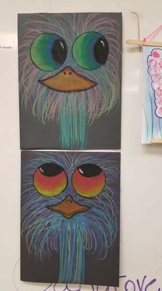 two paintings of an ostrich are hanging on the wall next to each other