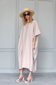 Be relaxed, free and safe in this oversized beige dress. Unique oversized tunic dress, made of viscose. Lightweight fabric very comfortable to wear on a hot day. Wear it even as a long tunic or dress. It's extremely versatile. The dress has short decorative sleeves. The dress has decorative belts on the side and hidden pockets in the side seam. The dress bottom is asymmetric. The dress is made of high-quality viscose and makes it a perfect casual wear. DIDRESS is part of the slow fashion movemen Summer Dress Plus Size, Oversized Tunic Dress, Maternity Long Dress, Plus Size Costume, Cocoon Dress, Loose Tunic, Slow Fashion Movement, Red Evening Dress, Oversized Tunic