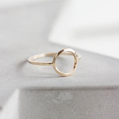 This circle ring represents the best traditions of minimalist jewelry - it is absolutely simple, but this simplicity is really beautiful. It looks gorgeous worn alone or in addition to other pieces. Wear it as a midi ring and as a regular ring - it will look awesome anyway.The ring is 1 mm thick and is very sturdy although it looks very dainty on the finger. The circle is approx. 10 mm diameter, so consider that it could look different on your ring size.You may order the ring of any size. If you 14k Gold Midi Rings For Everyday, Minimalist 14k Gold Filled Promise Ring, Modern 14k Gold Filled Rings For Gift, Modern 14k Gold Filled Rings As Gift, Silver 14k Gold Filled Rings, Modern 14k Gold-filled Rings For Gifts, Delicate 14k Gold Filled Midi Rings, 14k Gold Dainty Midi Rings, Modern 14k Gold Rings With Halo Design