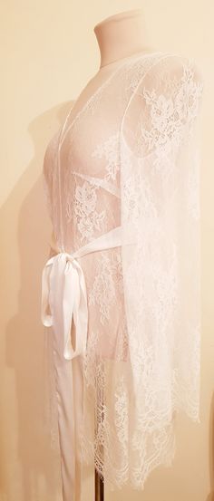 Off-white luxurious wedding robe, to add a perfect touch to your perfect and unique day. Only high quality fabrics and high finishing used for making the robe as neat as it can be. Please find the wedding robes collection here https://www.etsy.com/shop/LidiasBoutiqueDesign?ref=seller-platform-mcnav&section_id=25023222. For wedding dresses, please access https://www.etsy.com/shop/LidiasBoutiqueDesign?ref=seller-platform-mcnav§ion_id=23157290. For wedding tops and boleros, please access https: Wedding Tops, Robe Bridesmaids, Bridesmaids Robe, Wedding Robes, Robe Wedding, Satin Belt, Bridal Robe, Lace Nightgown, Wedding Robe