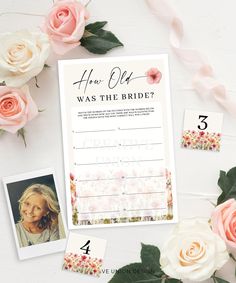 an image of a bridal party game with roses on the table and cards next to it