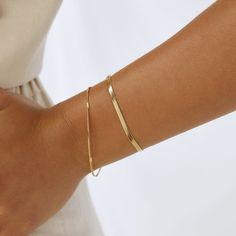 An elegant classic with a whole lot of style, our fine Willa Bracelet is here to create an elevated look for any occasion!﻿ Willa is designed to be stacked with any other gold or textured pieces to create the layering style of your dreams! 14k Gold Plated (1 Micron Thick)  Stainless Steel Base  E-coating for a premium finish  Lead & Nickel Free Layering Style, Gold Chain Bracelet, August Birthstone Jewelry, July Birthstone Jewelry, Layered Fashion, Jewelry Ring Box, Pearl Jewellery Earrings, Gold Bracelet Chain, Men's Jewelry Rings