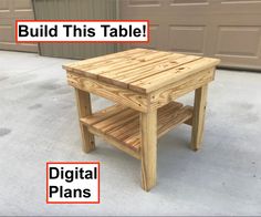 a wooden table sitting on top of a cement floor next to two garage doors with the words build this table