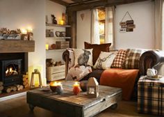 a living room filled with furniture and a fire place