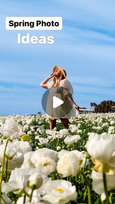 a woman walking through a field of white flowers with the caption spring photo ideas