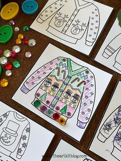 children's clothes and buttons are shown on the table with crafting materials around them