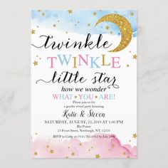 a pink and blue baby shower with gold stars