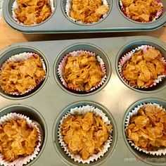 several muffins are in the pan ready to be baked