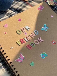 a notebook with the words our friend book written on it