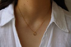 This dainty necklace is beautiful in its simplicity. D E T A I L S🌙 *It features a Korean-made gold plated hammered moon charm measuring 10mm x 8.5mm. *And a small crystal pendant. *It is suspended from a delicate 14k non tarnish stainless steel chain. *Length: Choose the length you prefer from the drop down menu. Use the length chart as a reference.  C A R E * T I P :  To keep your necklace in good condition please avoid contact with water, perfume and body lotion and remove when exercising or sleeping to preserve the beauty of the gold plated moon charm. Also store carefully as thin chains can easily tangle.   P A C K A G I N G All our products are gift ready. T E R M S* O F* S A L E S & F A Q https://etsy.me/2PuWBv6 F O L L O W Instagram: @Allaboutevecreations and  Facebook: www.facebo Moon Charm, Moon Necklace, Dainty Necklace, Stainless Steel Chain, Crystal Pendant, Charm Necklace, Gifts For Kids, Gold Necklace, Jewelry Necklaces