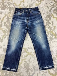 Distressed Blue Vintage Levi's 502 Jeans 31x28 Denim- JN3622 Size: 31 Actual measurement (inches): Waist - 31 Front Rise - 11 Hips - 42 Thigh - 11.5 Knee - 9 Leg Opening - 17 Inseam - 28 Outseam - 39 Material : Cotton    #JN3622 Relaxed Fit Distressed Medium Wash Cropped Jeans, Faded Ripped Cropped Denim Jeans, Classic Distressed Relaxed Fit Jeans, Classic Blue Jeans With Frayed Hem, Distressed Faded Straight Leg Cropped Jeans, Faded Distressed Straight Leg Cropped Jeans, Faded Distressed Denim Cropped Jeans, Casual Blue Distressed Cropped Jeans, Faded Distressed Mid-rise Cropped Jeans