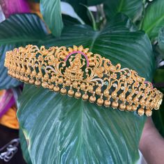 This vaddanam has high-quality Pearls, American Diamonds, Semi-precious Ruby, and emeralds. Ideal for weddings and special occasions. Traditional wedding accessories for silk sarees and most preferred jewelry for grand family occasions and parties.    *Total length of the hip belt (end -to end) is 31 Inches, but suitable for a hip size less than 29 Inches.   *Design on the Front portion is 9 inches. The rest is made up of a one-inch wide flat belt.  The height of the center portion with the desi Temple Jewelry Bridal Belt With Tilla For Wedding, Gold Temple Jewelry Style Bridal Belt For Wedding, Festive Temple Jewelry Bridal Belt For Wedding, Ceremonial Temple Jewelry Bridal Belt With Tilla, Traditional Wedding Accessories, Hip Belt, Temple Design, Belly Chain, Copper And Brass