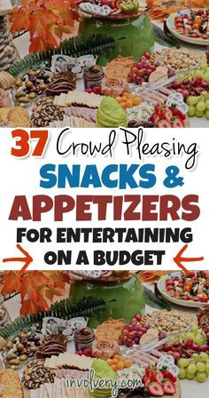 a table full of snacks and appetizers for entertaining on a budget