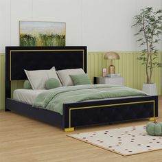 a large bed sitting on top of a wooden floor next to a potted plant